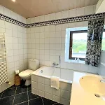 Le Manoir W בית אירוח